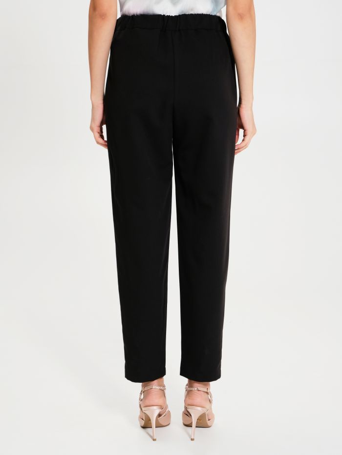 Rinascimento Pantaloni Carota con Punto Smock Promozione temporanea