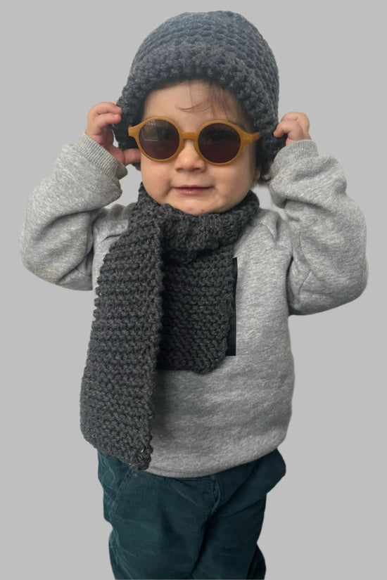 ﻿Zerobarracento Hand-knitted wool scarf for baby Qualità Garantita