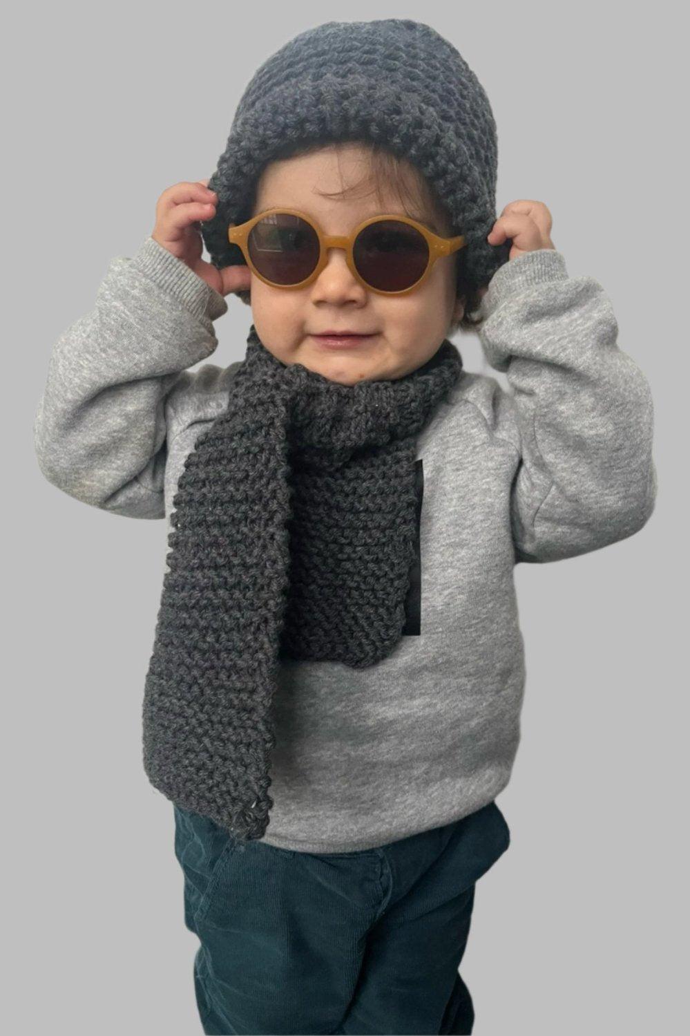 ﻿Zerobarracento Hand-knitted wool scarf for baby